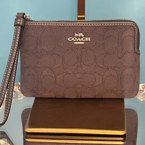 Coach Handbags - Coach Signature Navy Blue Wristlet Approx. 6 x 4 NWT